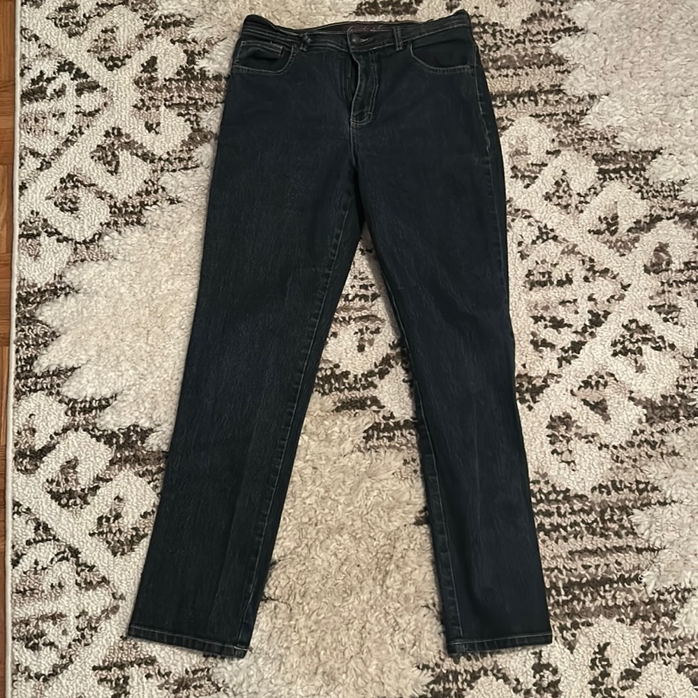 classic fit five pocket jeans sit right at-the waist feature tapered legs